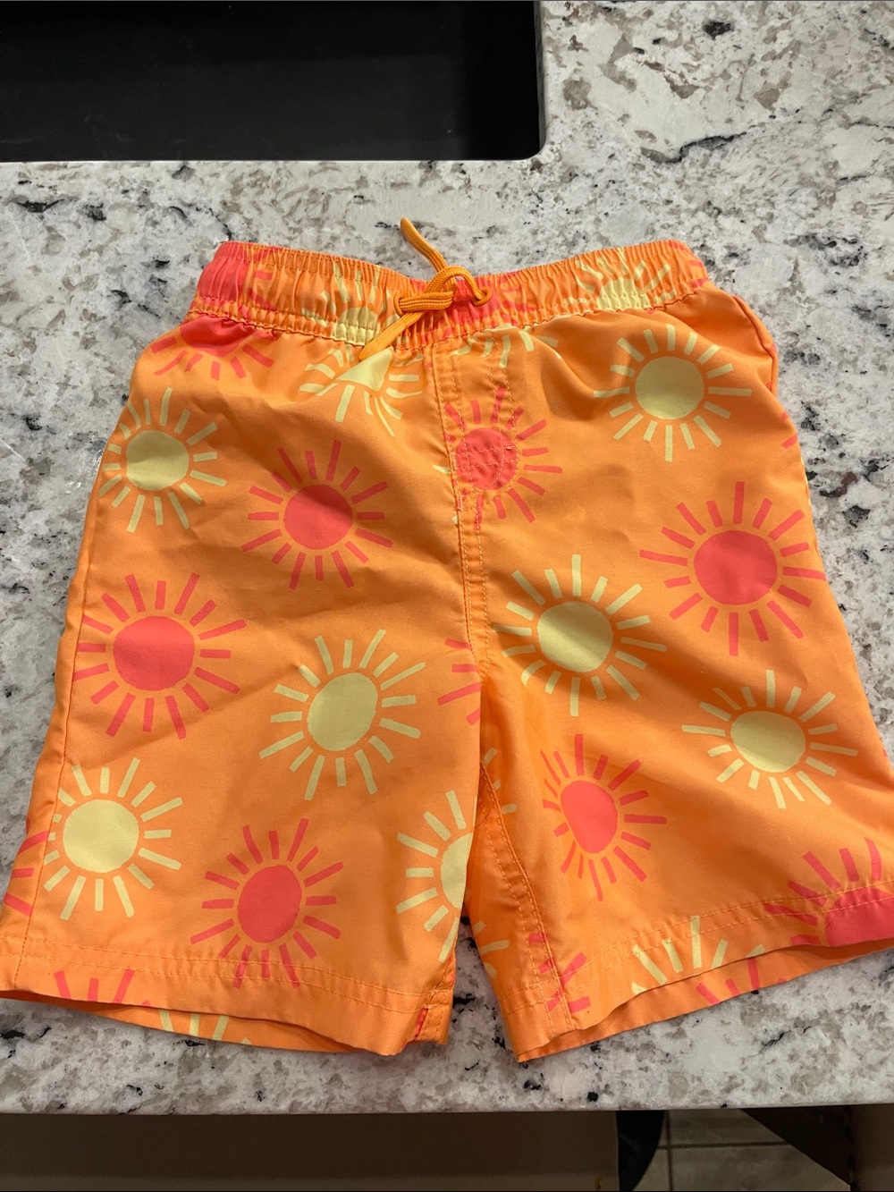 Kids Orange Sun Print Swim Shorts with Elastic Waist